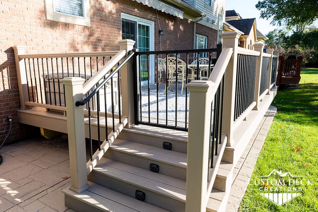 Backyard deck stairs with gate