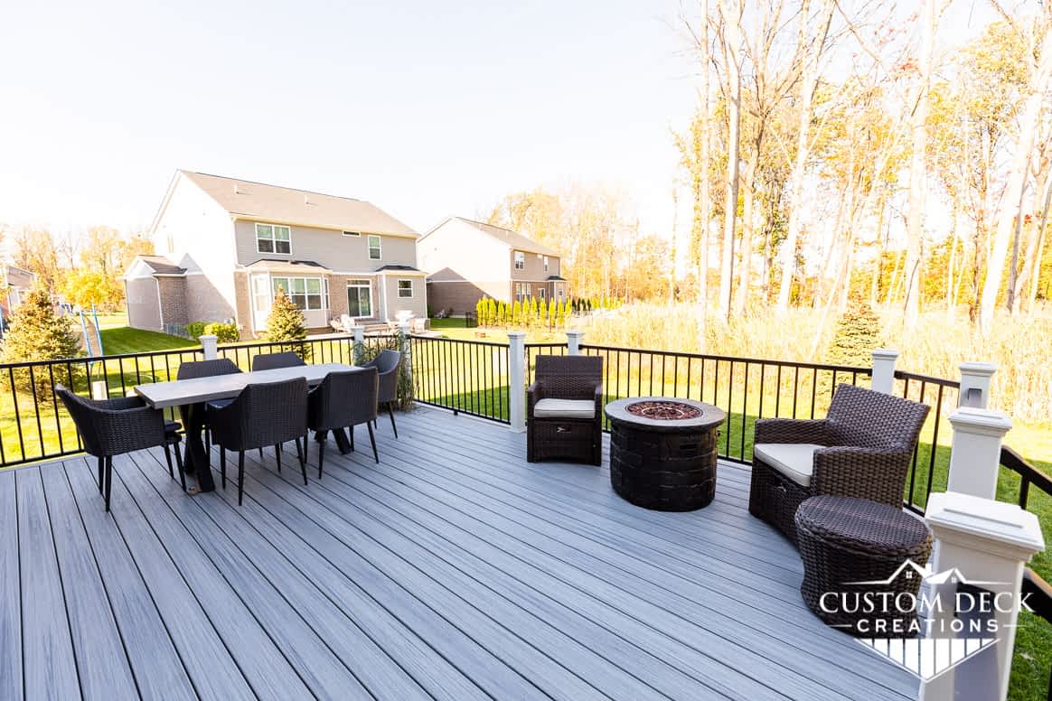 Trex deck on new home showing open backyard in Canton MI