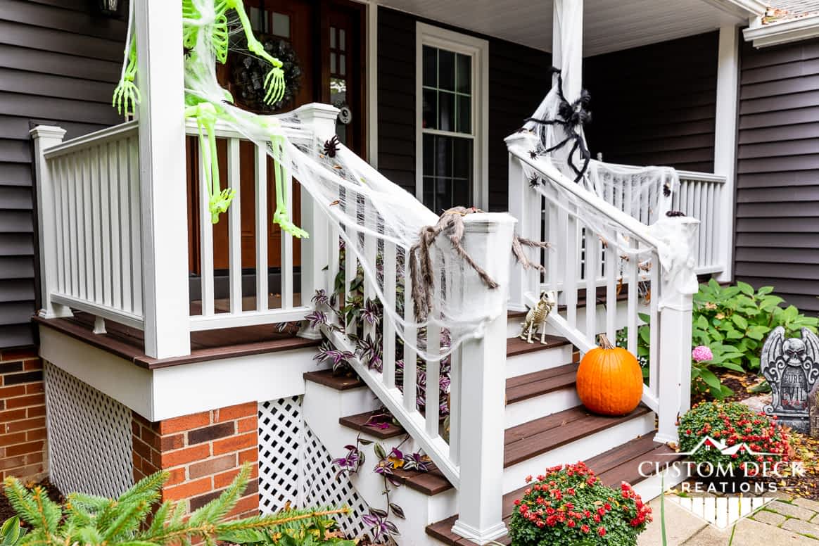 Pumpkins and Halloween decorations on front porch