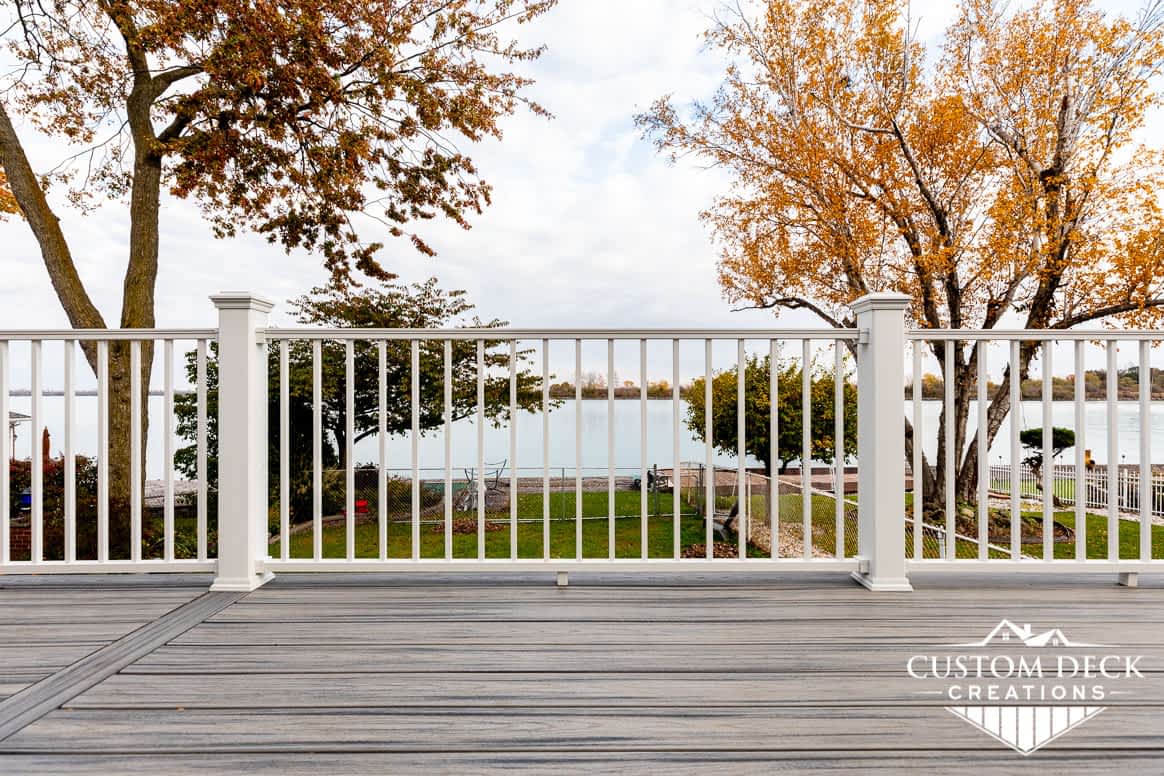 White Trex railing with lake background view