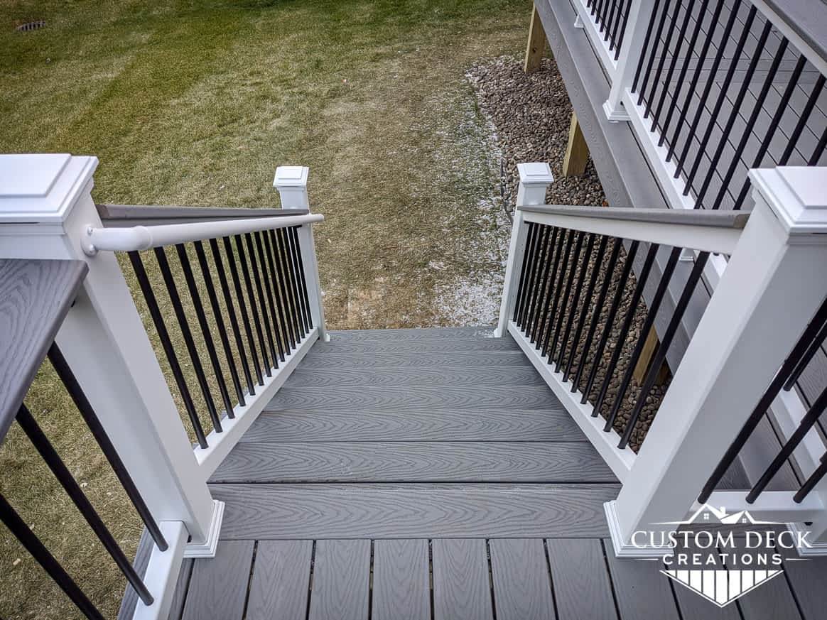 Looking down stairs on an outside deck