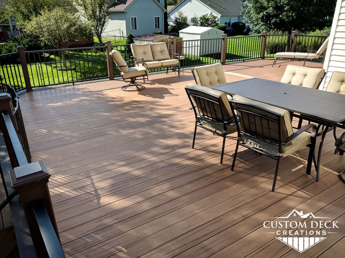 Large backyard brown composite deck
