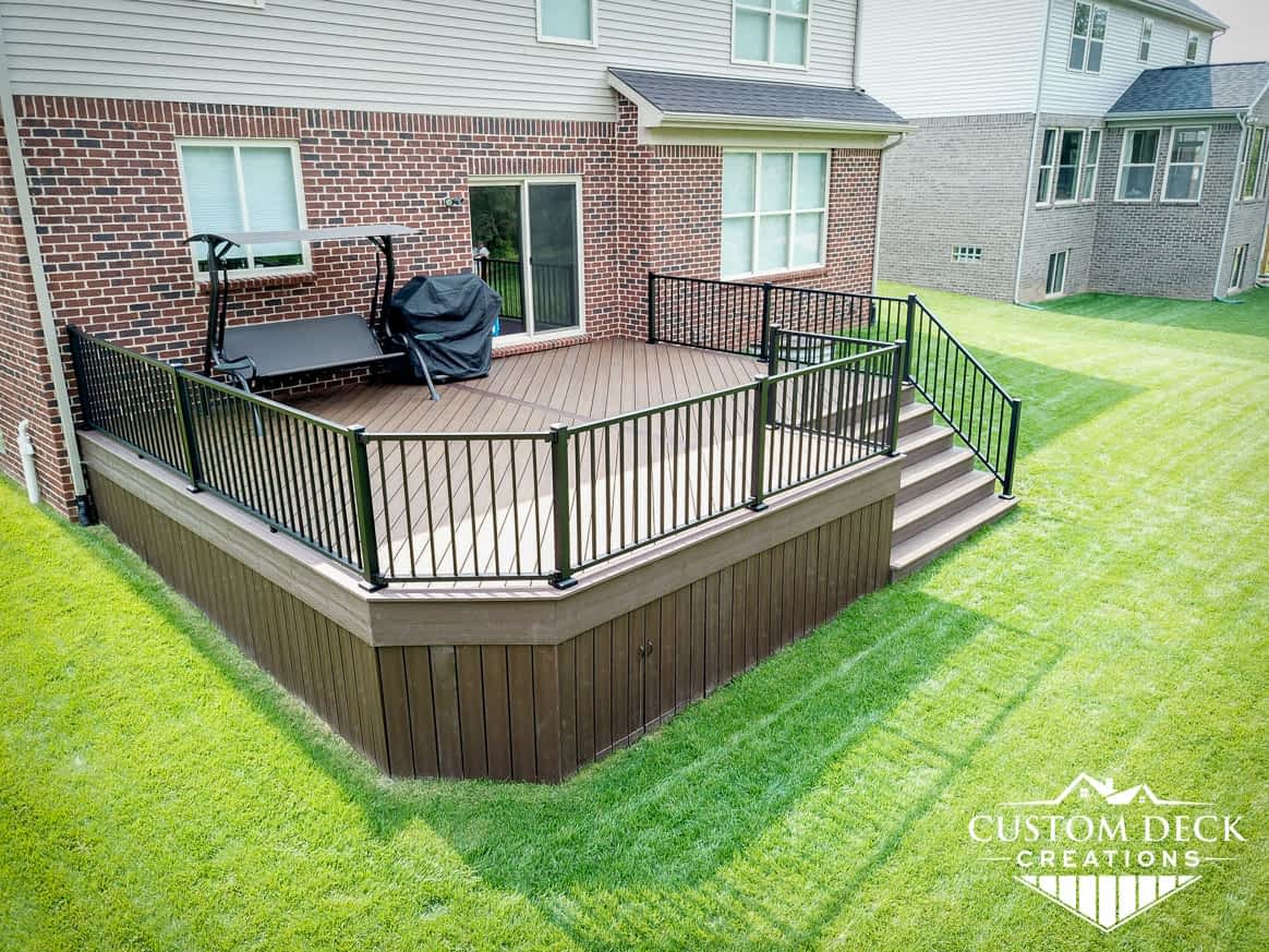 Outdoor Trex deck in Canton Michigan with skirting and built in access panel