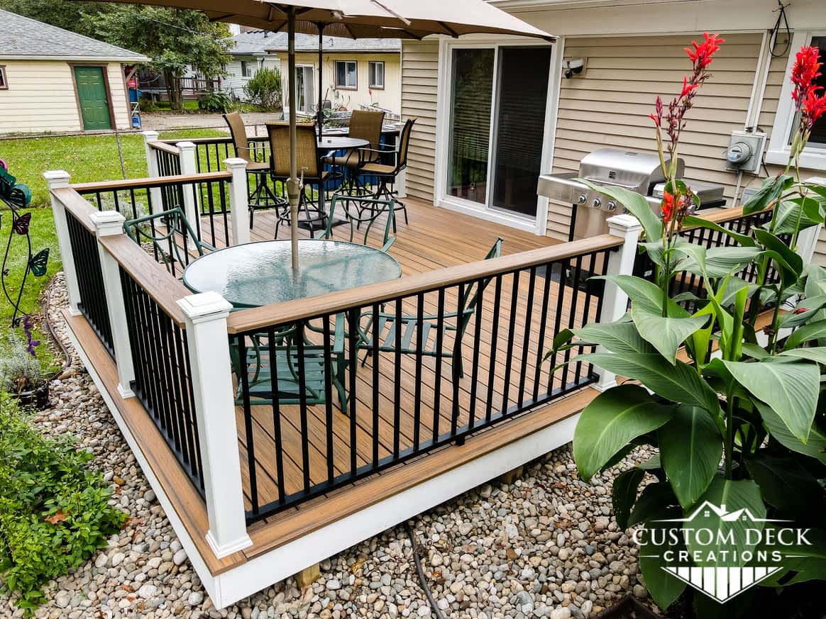 Maintenance-free deck with cocktail railing