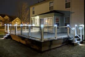 Ypsilanti composite Trex deck with lights built by Custom Deck Creations