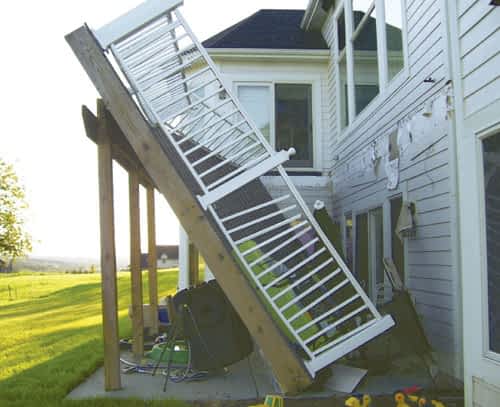 Deck that collapsed fell off the side of a house where it was ledgered