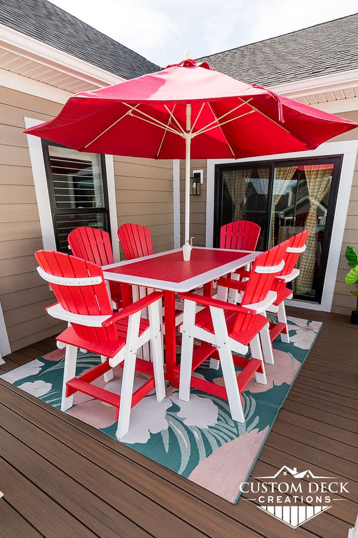 Red patio furniture on new Trex deck
