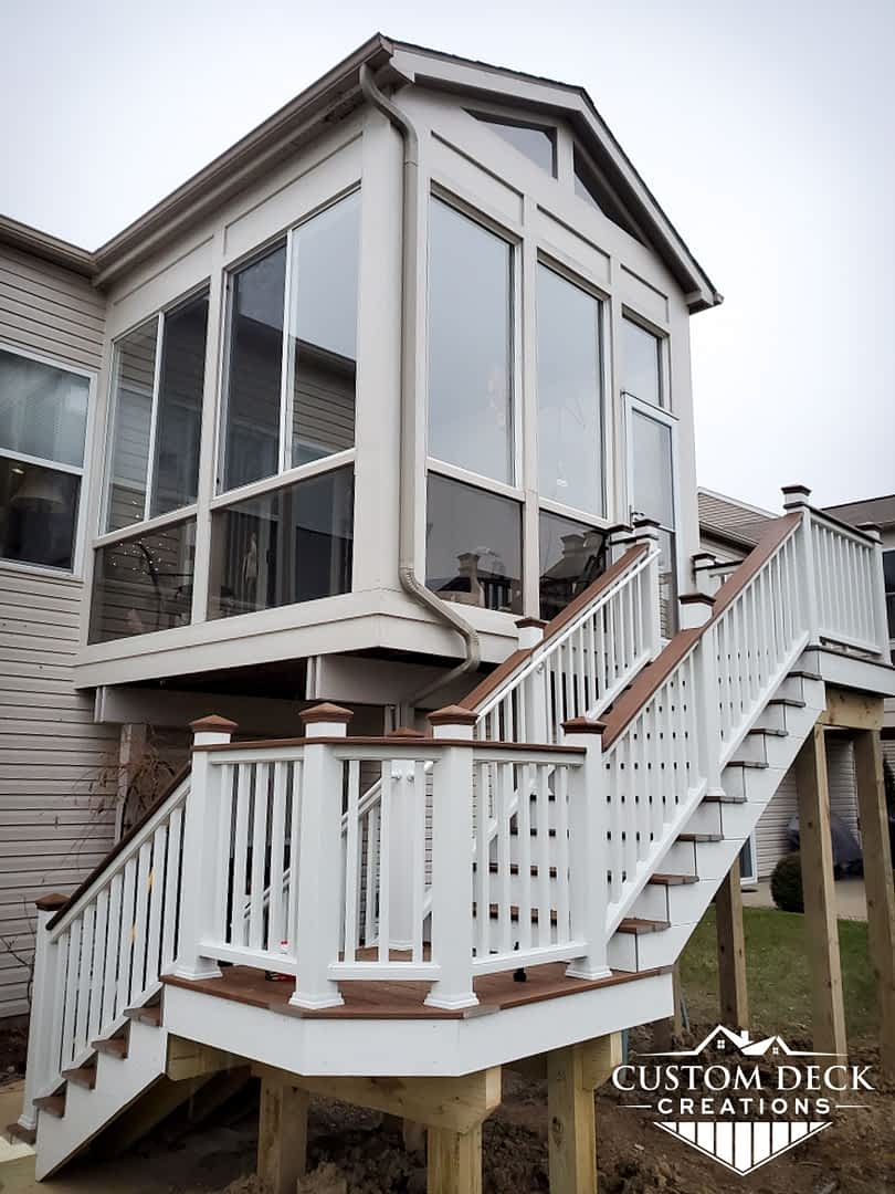 Outside stairs leading to a 2nd story sunroom